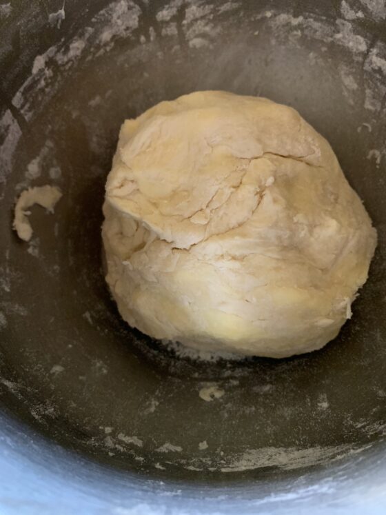 Mixing bowl with kneaded pie dough ball